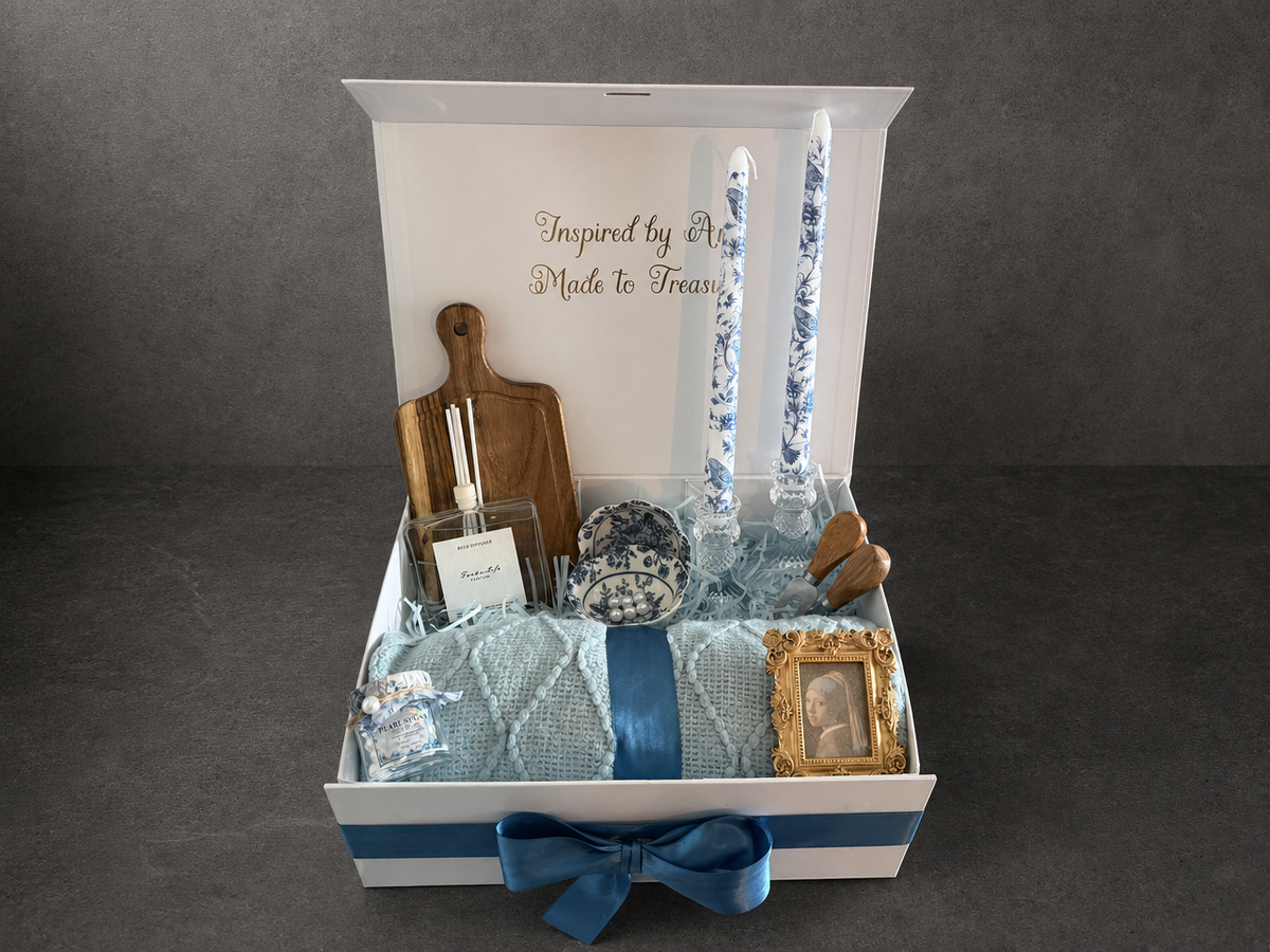 Open Vermeer Girl with a Pearl Earring gift box with blanket, Delft candles and framed portrait
