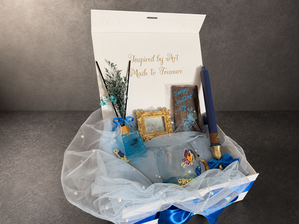Open Van Gogh Almond Blossom gift box with blue candle, glass cup and gold frame